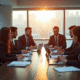 Groupe de professionnels en réunion dans un bureau lumineux